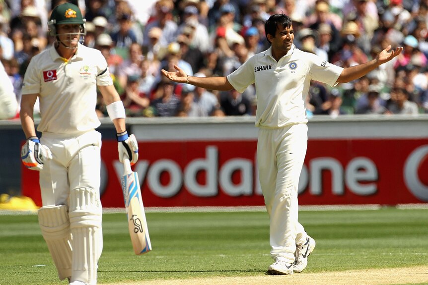 Zaheer Khan of India celebrates after taking the wicket of Brad Haddin