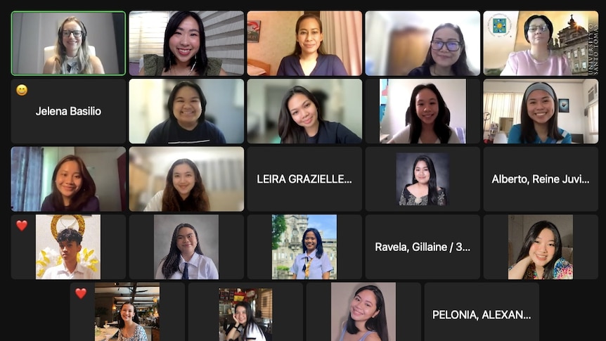 A screenshot of twenty four people on a video call smiling at their webcams. Some people don't have their cameras turned on.