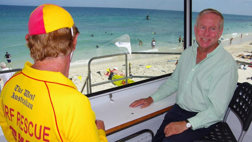 Premier Colin Barnett in a watchtower at Cottesloe beach