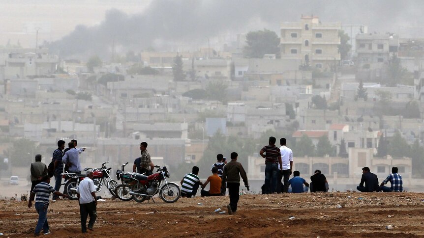 Turkish watch over Kobane