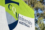 A green and white sign reads CQ University Australia