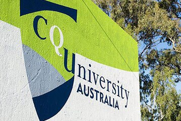 A green and white sign reads CQ University Australia
