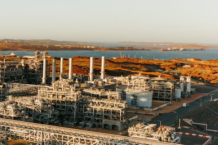 A gas production plant during sunset
