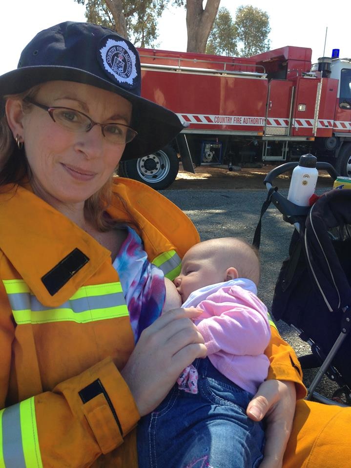 CFA volunteer Angela Joy breastfeeds her baby at a community event