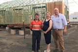 Builder with Luke and Kimberly Dwyer standing in front of build.