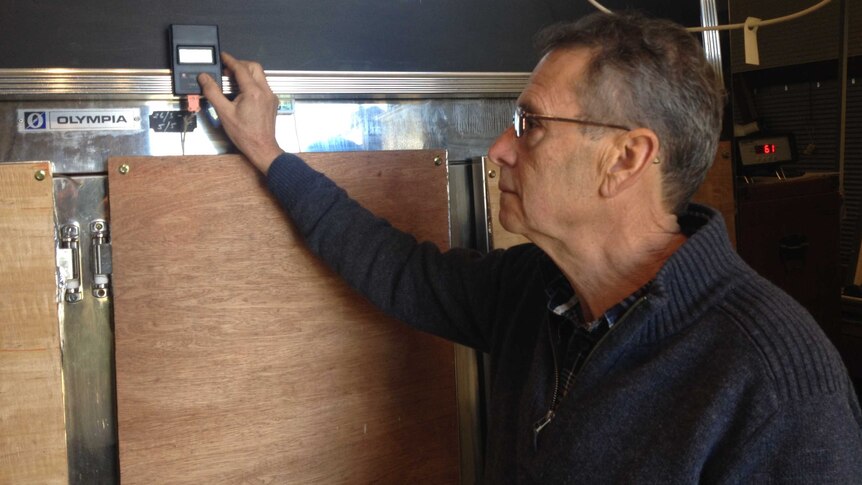 John Pye keeps a close eye on the fermentation process