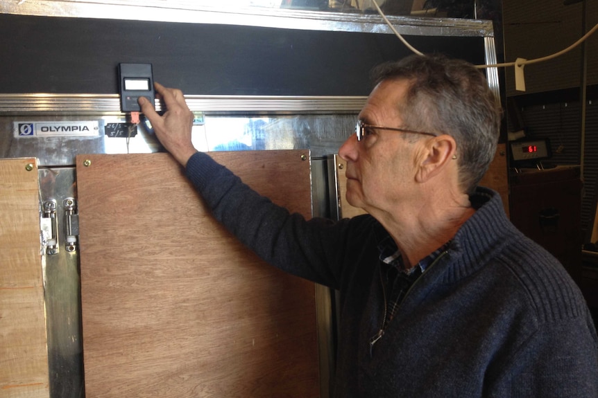 John Pye keeps a close eye on the fermentation process