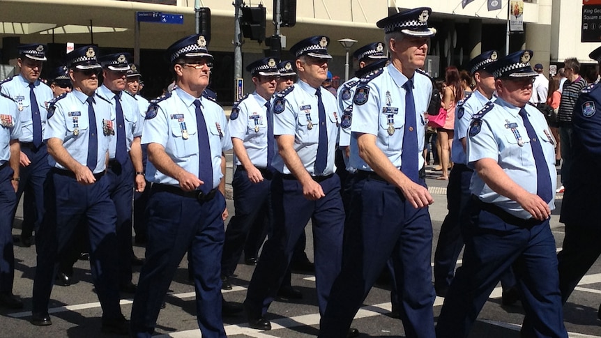 Officers march through Brisbane's CBD for Police Remembrance Day on September 28, 2012.
