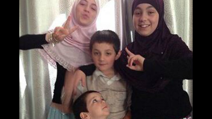 Khaled Sharrouf's children Zaynab (pink scarf), Hoda (black scarf), Abdullah(centre) and Hamzah (front).