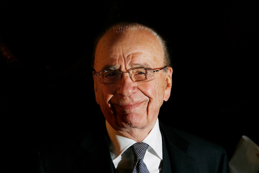 A close up picture of Rupert Murdoch smiling