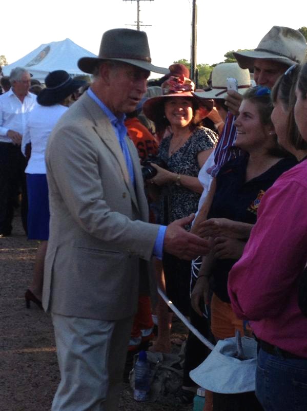 The Prince of Wales greets some of the Longreach locals during his visit to the town.