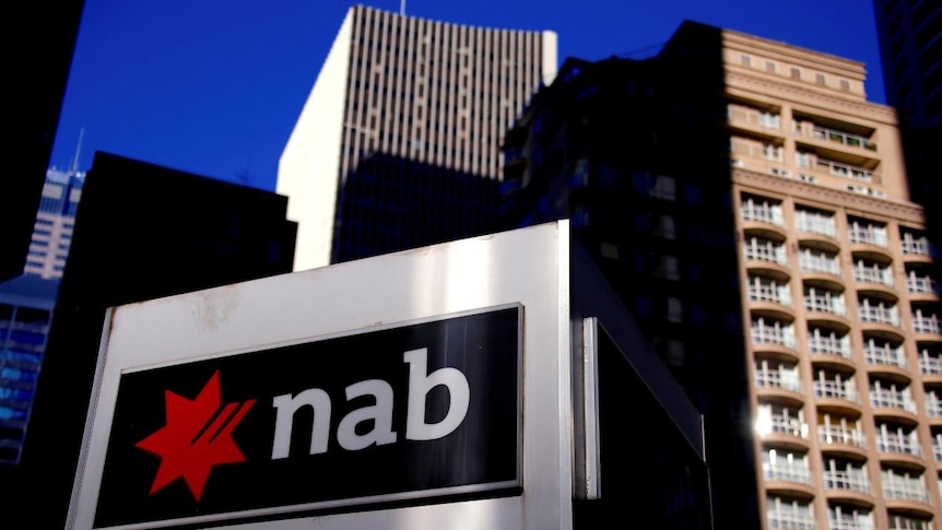 FILE PHOTO: The logo of the National Australia Bank is displayed outside their headquarters building in central Sydney, Australia August 4, 2017.