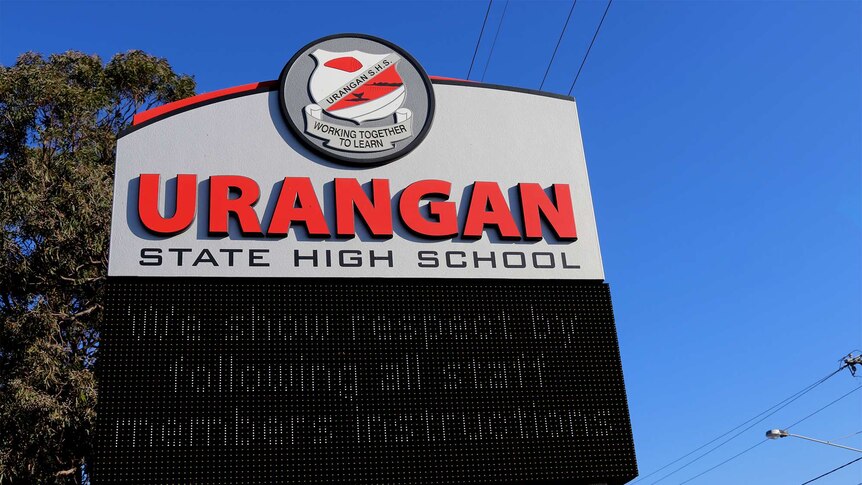 an electronic school sign outside a highschool