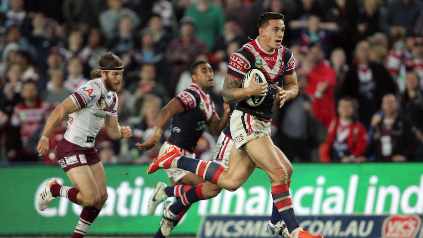 Roosters second-rower Sonny Bill Williams runs with the ball against the Sea Eagles.