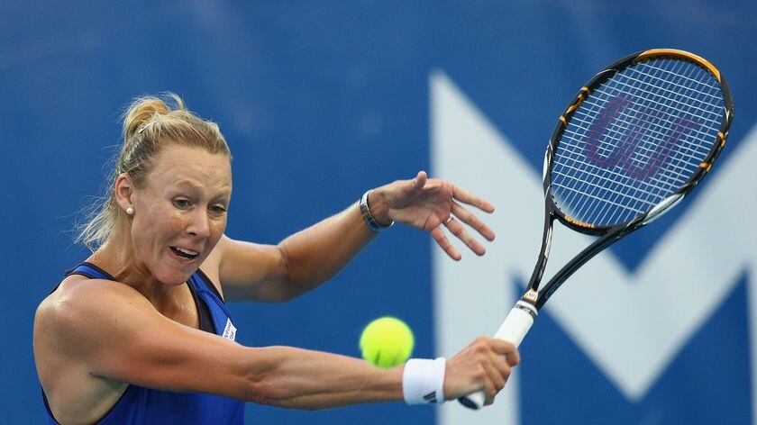 Strong start... Alicia Molik plays a backhand in her first round match against Sania Mirza.