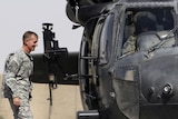 US General Stanley McChrystal boards a Black Hawk helicopter in Afghanistan.