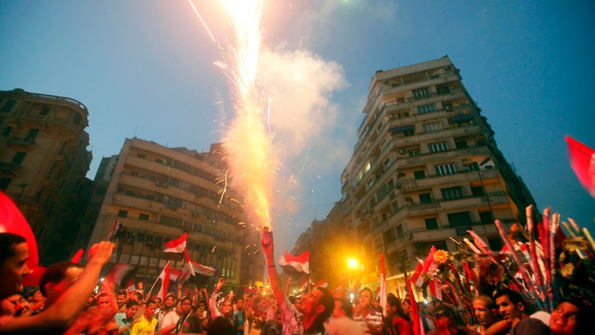 People in Tahrir Square celebrate the victory of Mohamed Mursi.