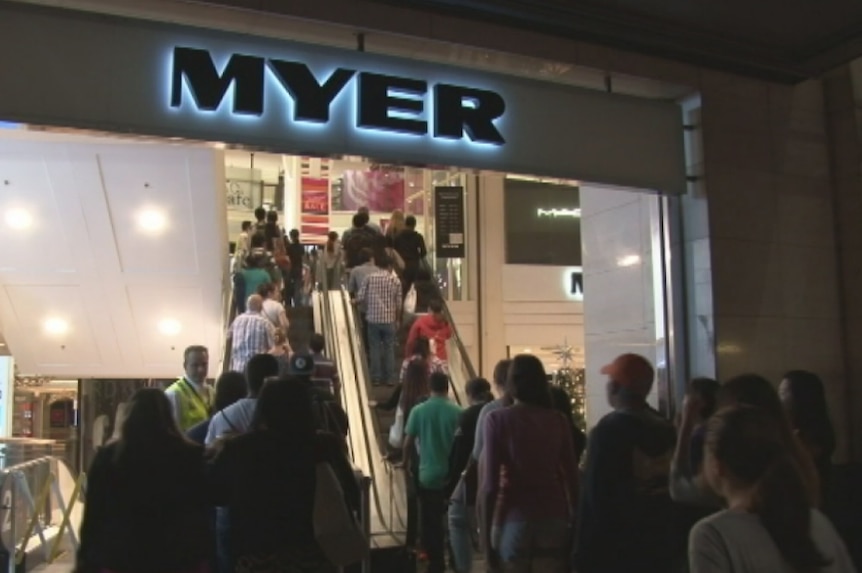Crowds enter Myer's Sydney CBD store in the early hours of Saturday morning.