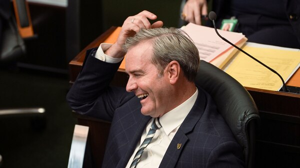 Man sitting in parliament.