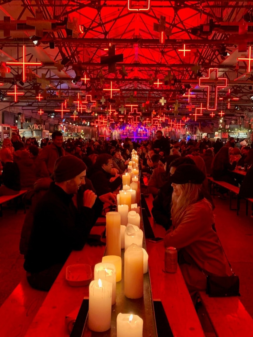 People sitting and eating at Dark Mofo's Winter Feast