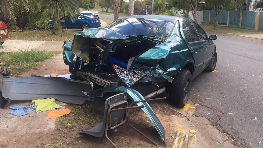 Parked car hit by ute