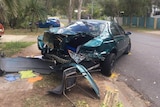 Parked car hit by ute