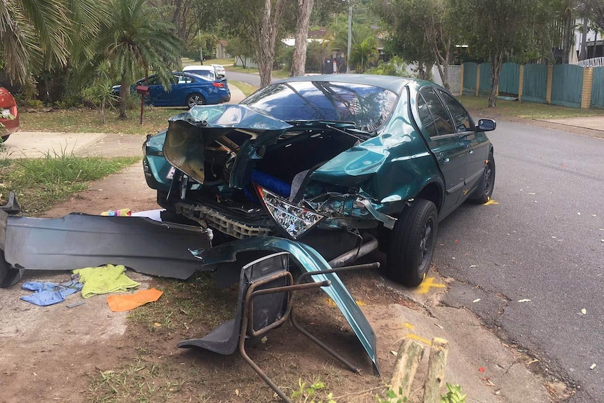 Parked car hit by ute