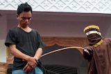 Man suffers public caning in Aceh