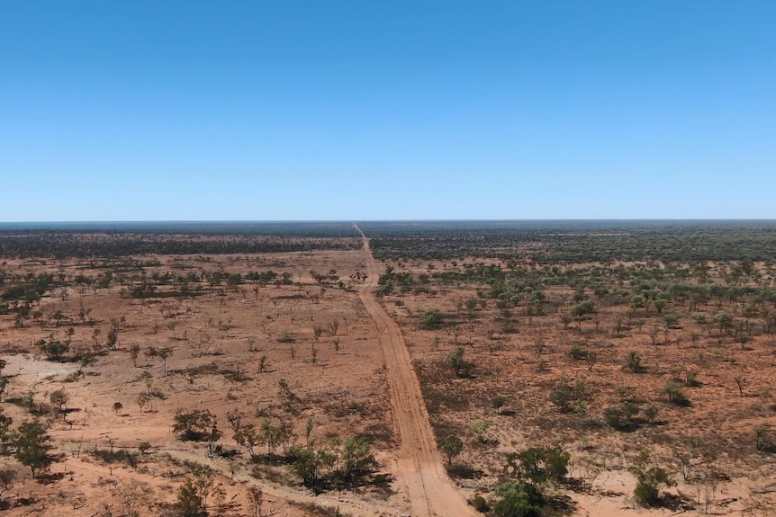 Drone shot of a fence line between two western Queensland properties