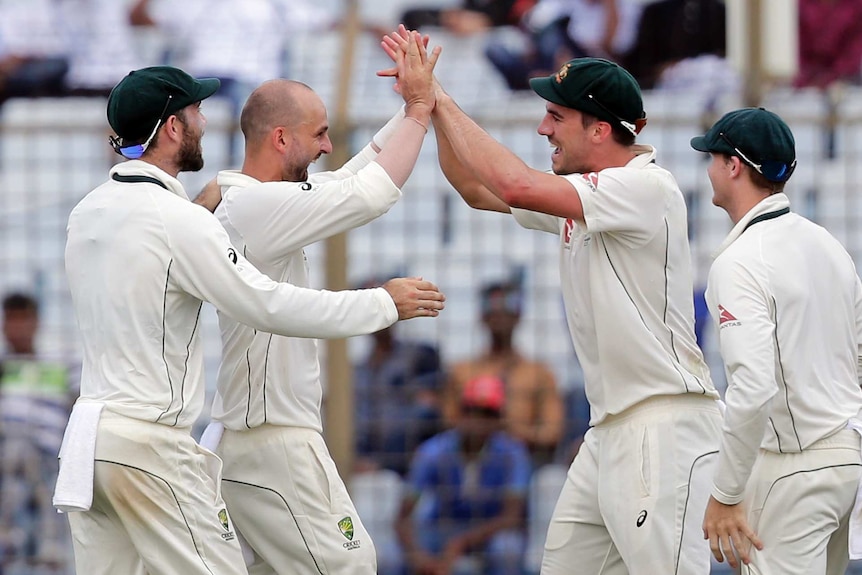 Australia's Nathan Lyon celebrates dismissal of Bangladesh's Mominul Haque