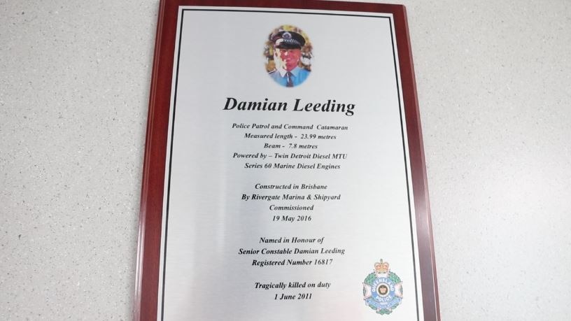 A plaque with a photo of a police officer