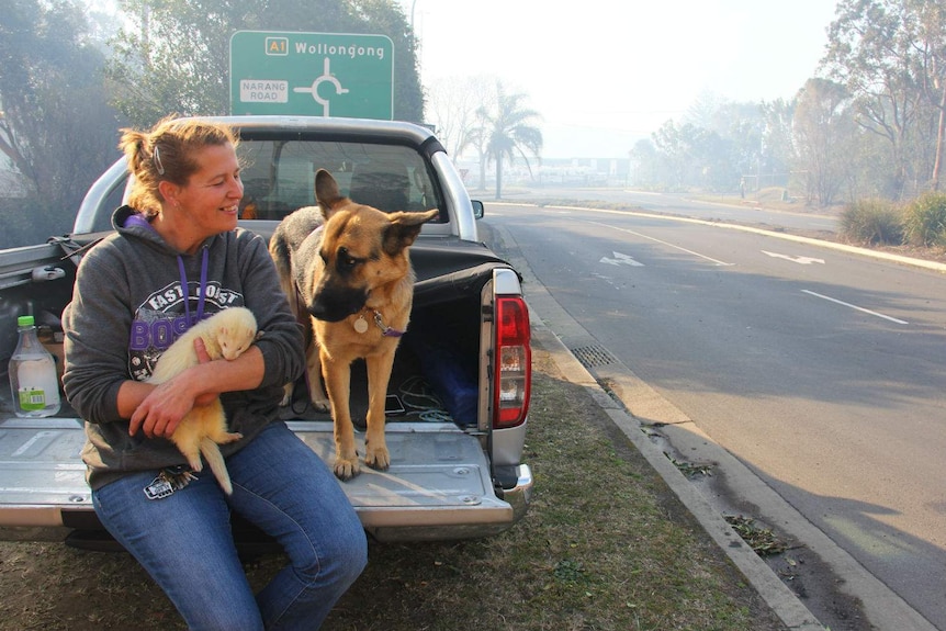 A woman with two pets