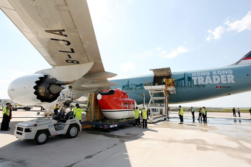 Cargo is loaded onto the 747