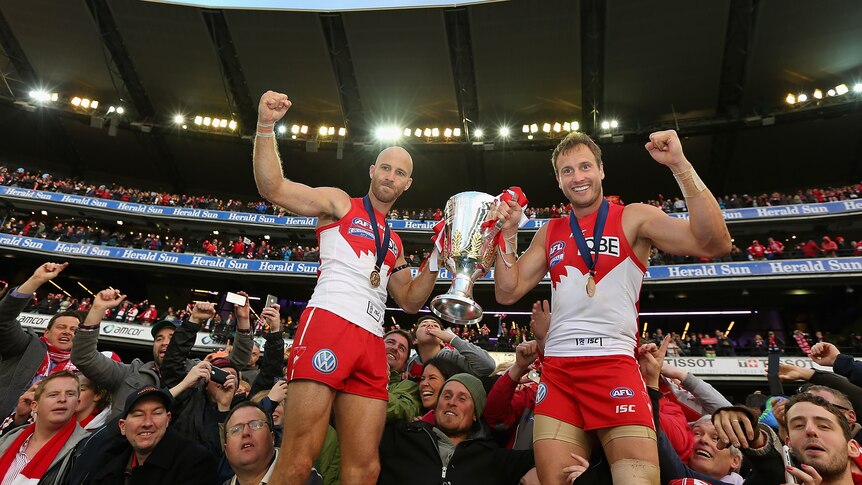 Jarrad McVeigh and Jude Bolton after winning the 2012 grand final for Sydney