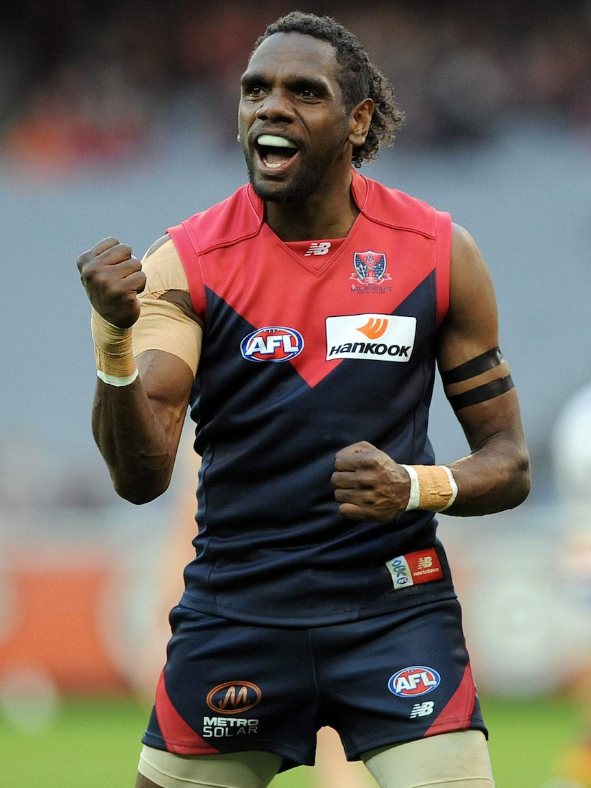 Melbourne's Liam Jurrah celebrates after kicking a goal.