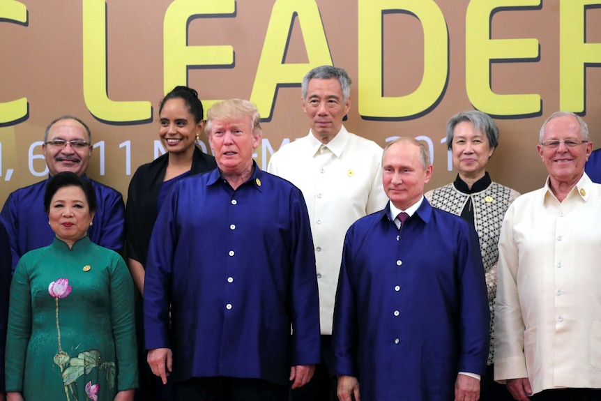 US President Donald Trump and Russian President Vladimir Putin take part in a family photo