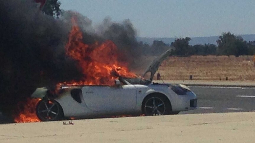 Porsche bursts into flames