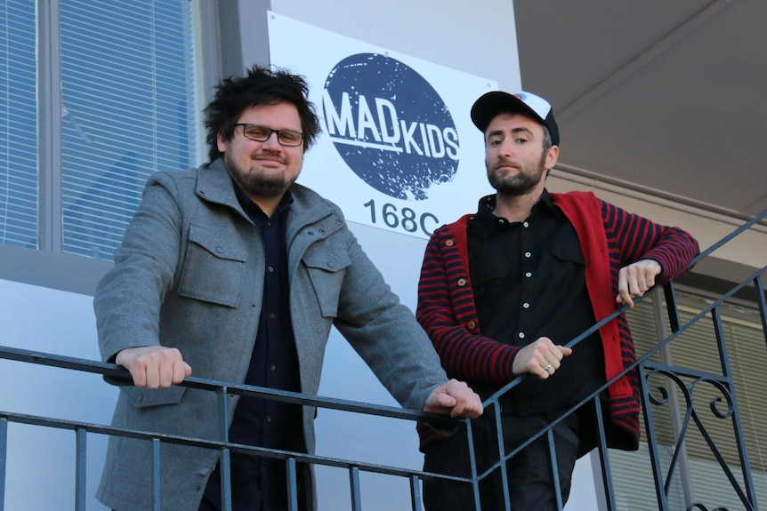 Filmmakers Henry Inglis (left) and Aaron McCann stand outside their Perth office.