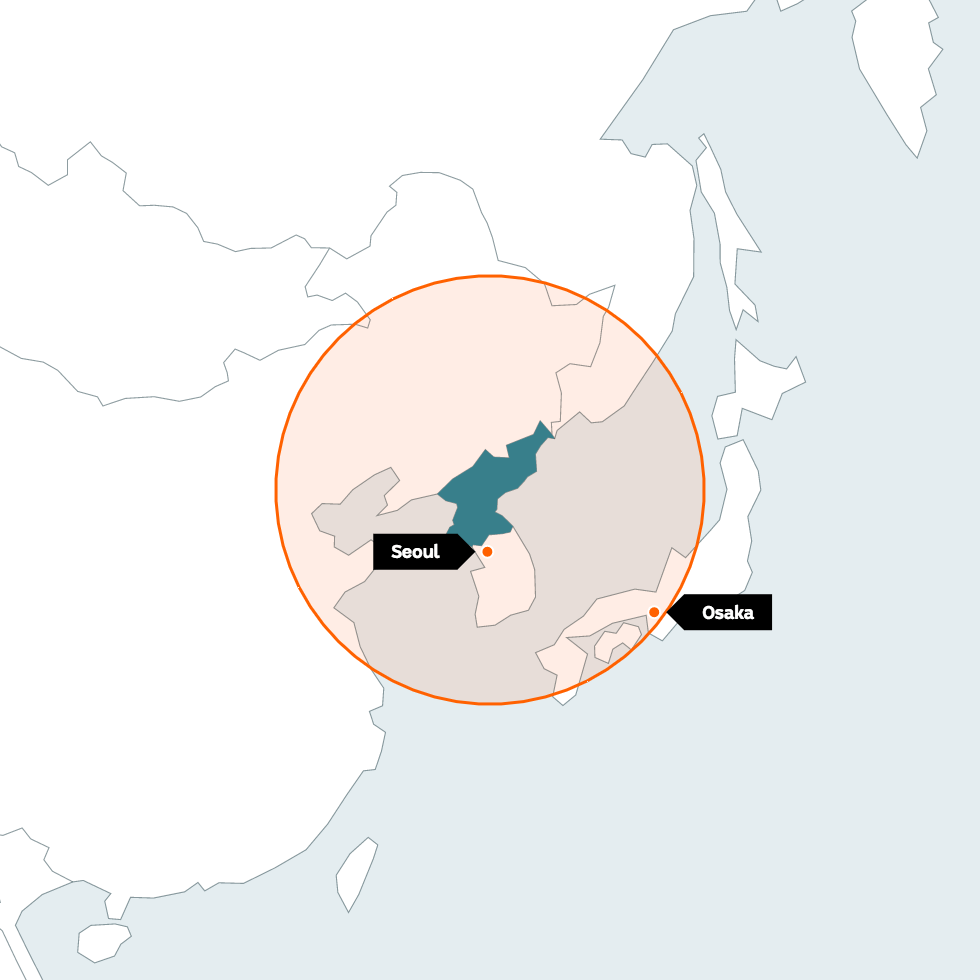 A red circle around North Korea, shows the range of its short-range ballistic missiles. Seoul and Osaka are inside the circle.