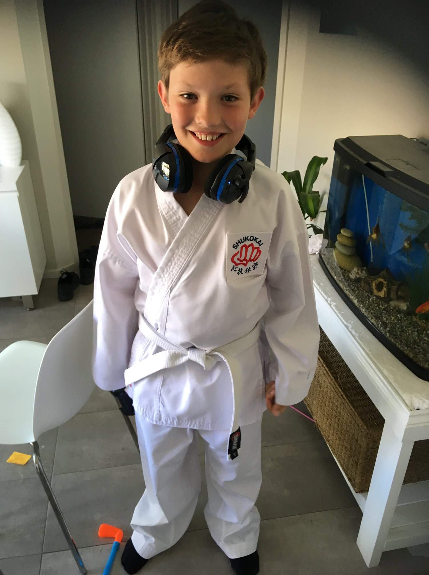 A boy in a karate uniform