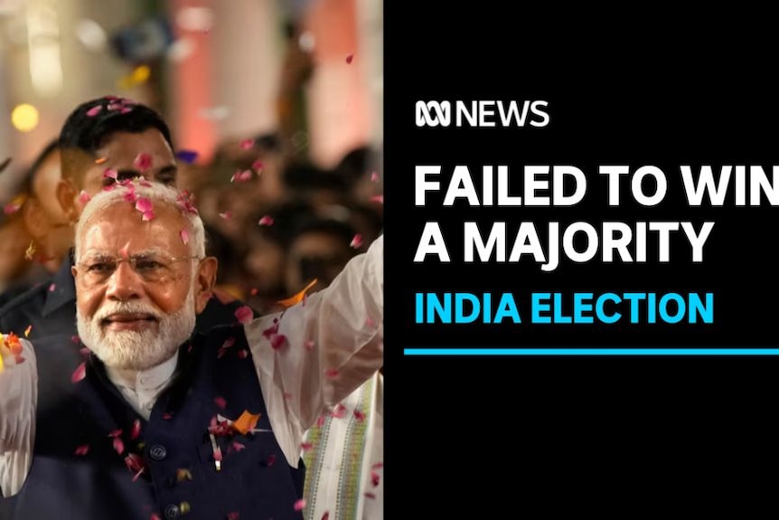 Failed to win a majority, India election: A man with a white beard stands in front of a crowd with confetti