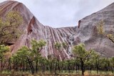 rain pouring down Uluru