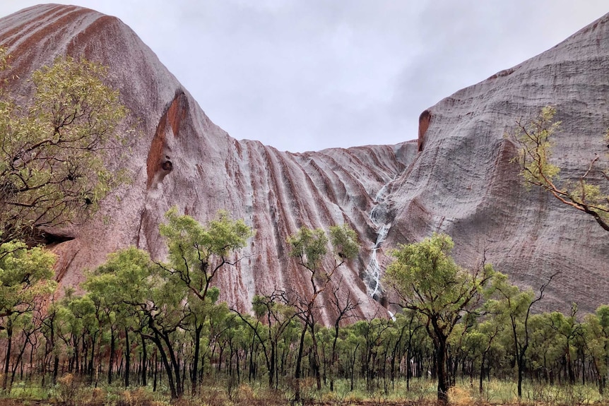 rain pouring down Uluru