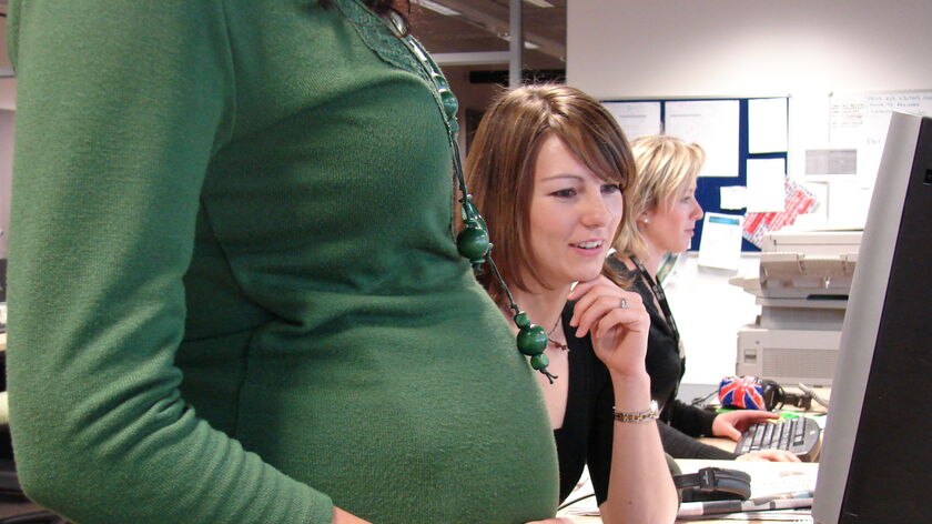 Pregnant woman in an office. (ABC, file photo)