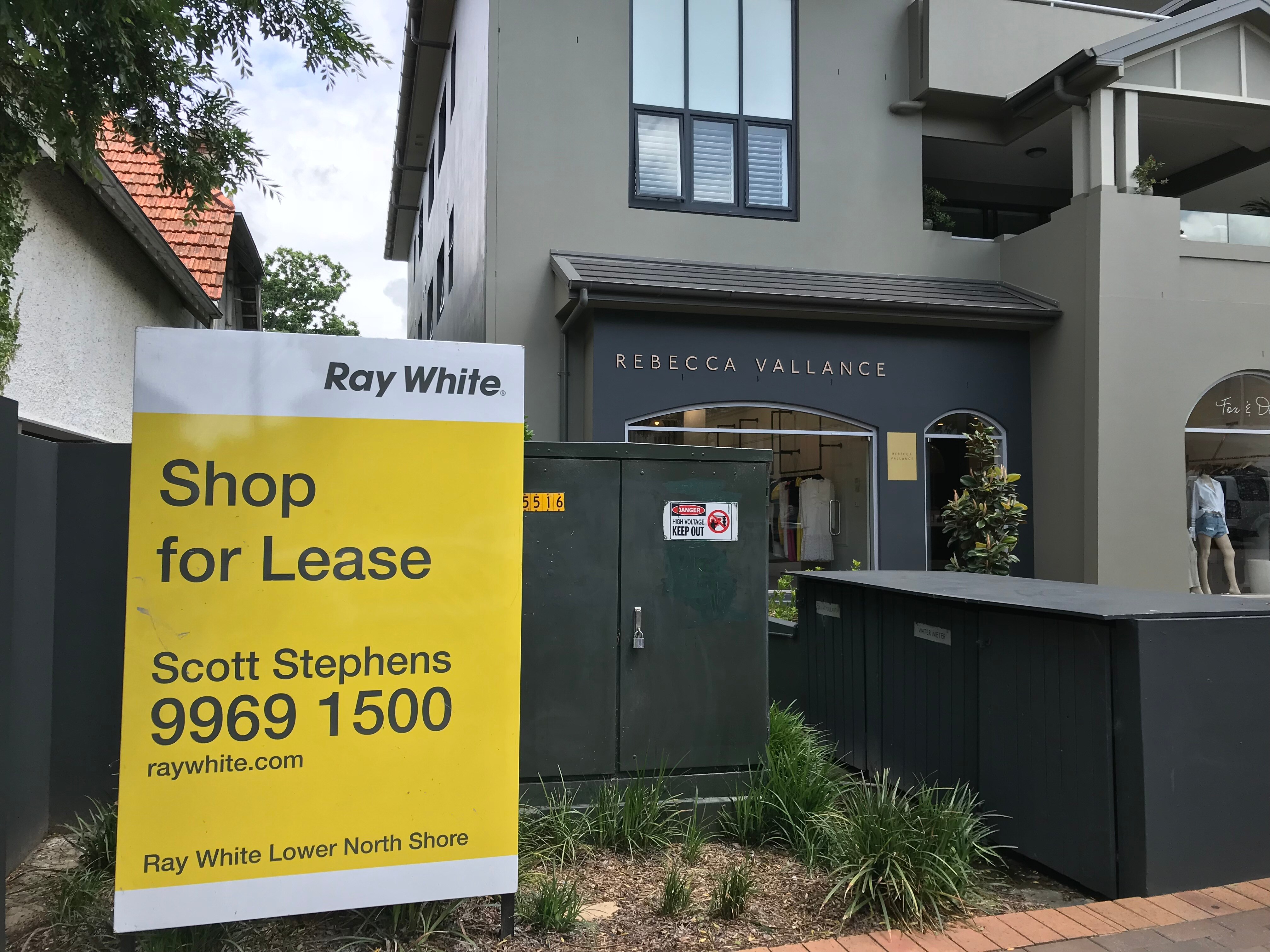 Suburban shop with for lease sign out the front