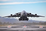 A C-17A Globemaster takes off