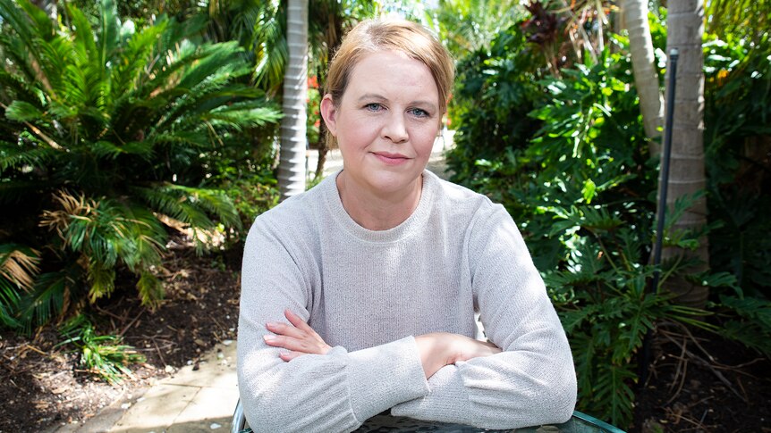 Kirsty Rich sitting in a garden, in a story about being homeless with four children amid COVID.