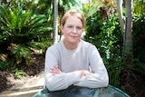 Kirsty Rich sitting in a garden, in a story about being homeless with four children amid COVID.