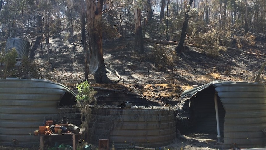Water tanks damaged by fire at Separation Creek