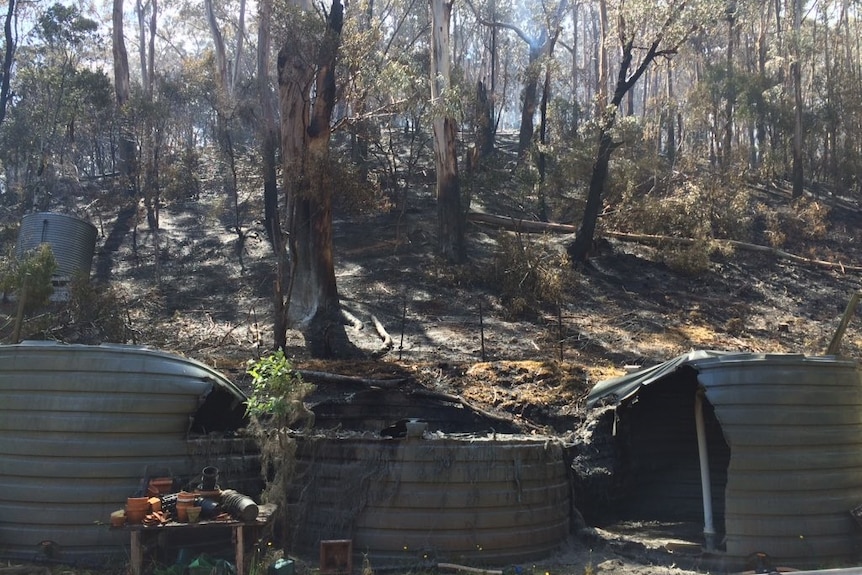 Water tanks damaged by fire at Separation Creek